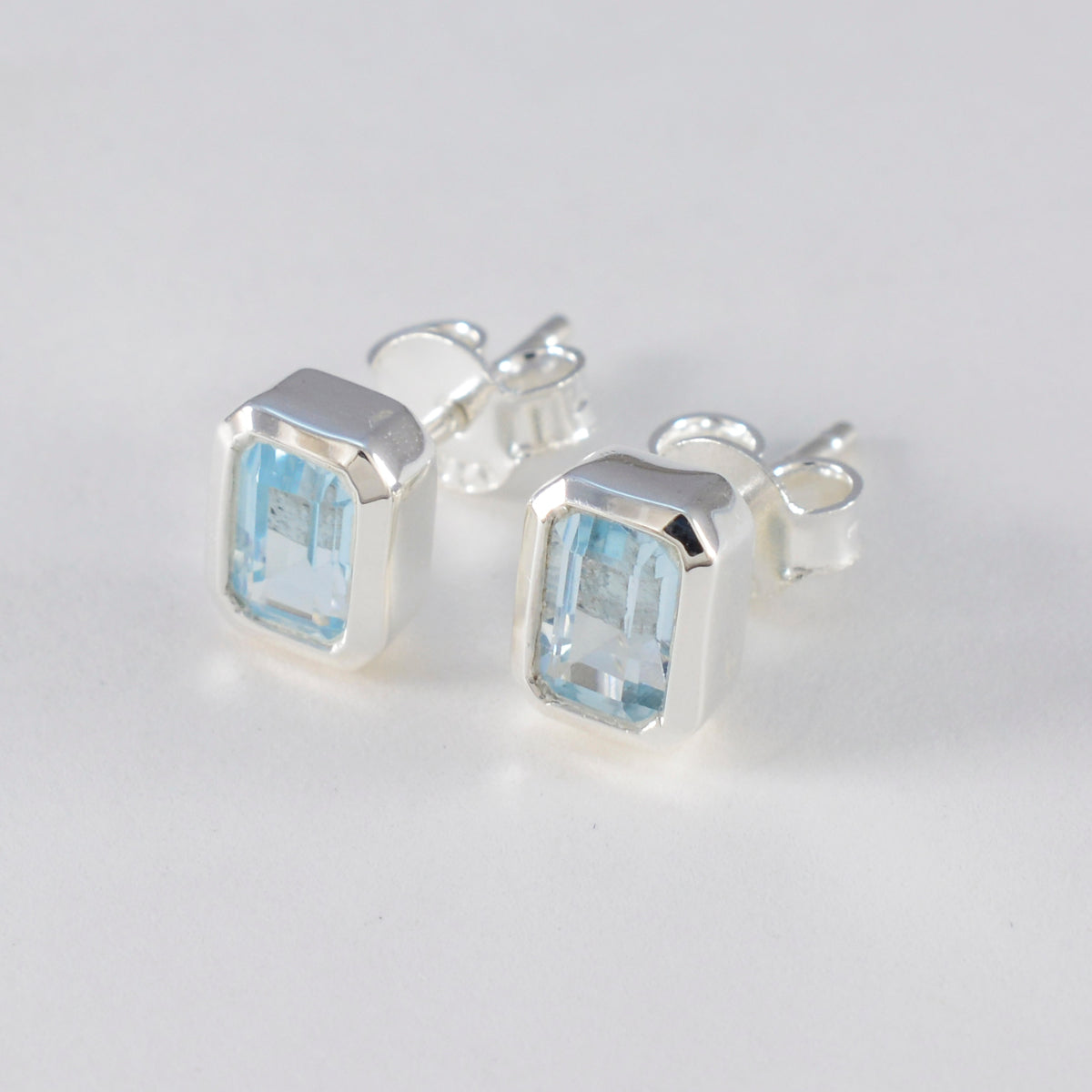 Lourdes Blue Earrings with Elegant Gemstone Design