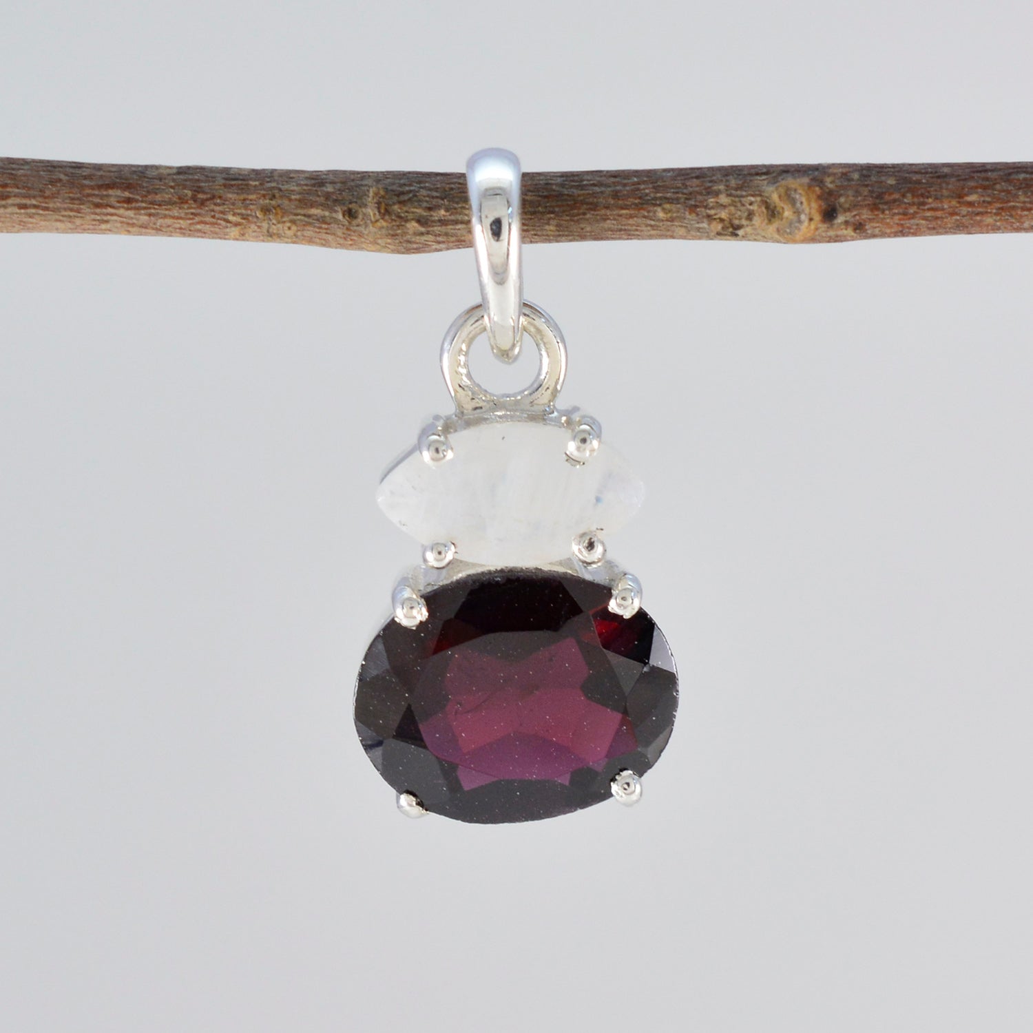 Zoey luxurious multicolor pendant featuring an elegant red gemstone with transparent accents