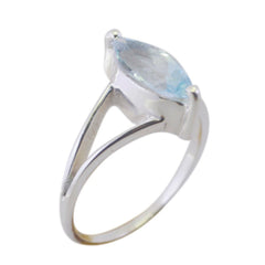 Zoey modern blue solitaire ring featuring a marquise-cut blue gemstone set in a sleek silver band