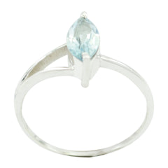 Zoey modern blue solitaire ring with a marquise-cut gemstone set in a sleek band