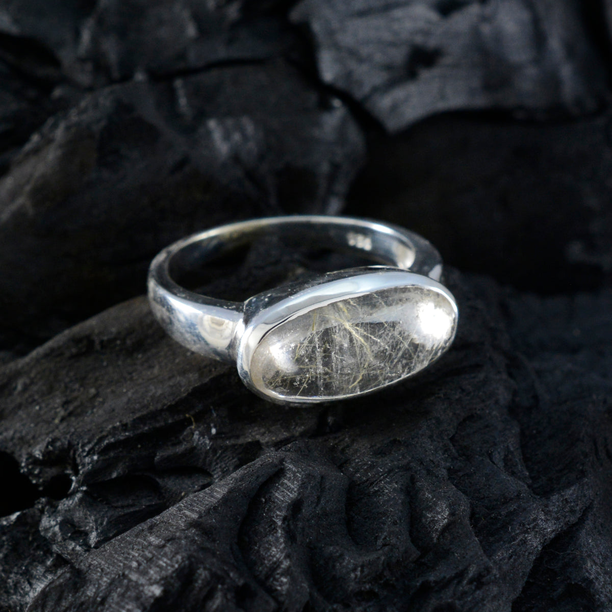 Claire modern solitaire ring for women with oval clear gemstone on silver band