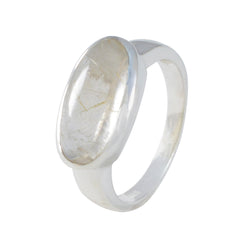 Claire modern solitaire ring for women with an oval translucent gemstone set in silver band