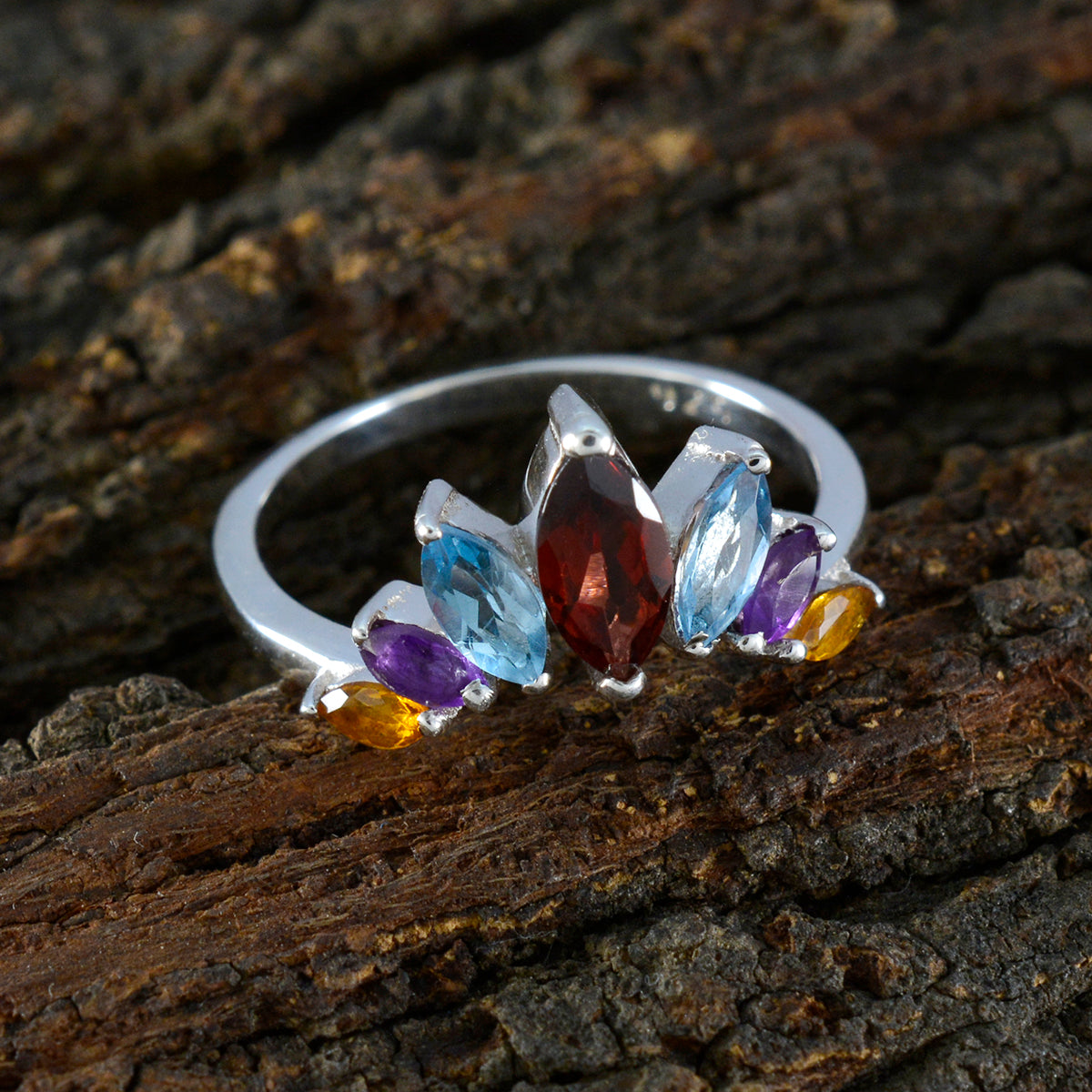 Dewi multicolor gemstone crown ring with varied colored stones set on silver band