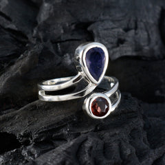 Silver multicolor Toi et Moi ring featuring a purple and red gemstone in a stylish design