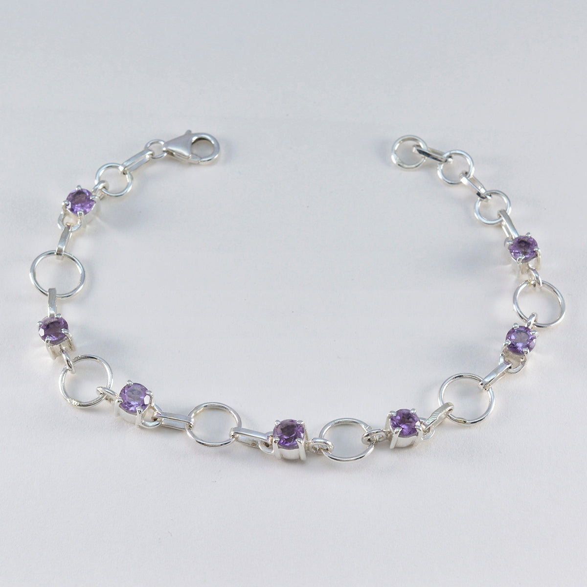 Abigail purple bridal bracelet featuring amethyst gemstones set in silver links