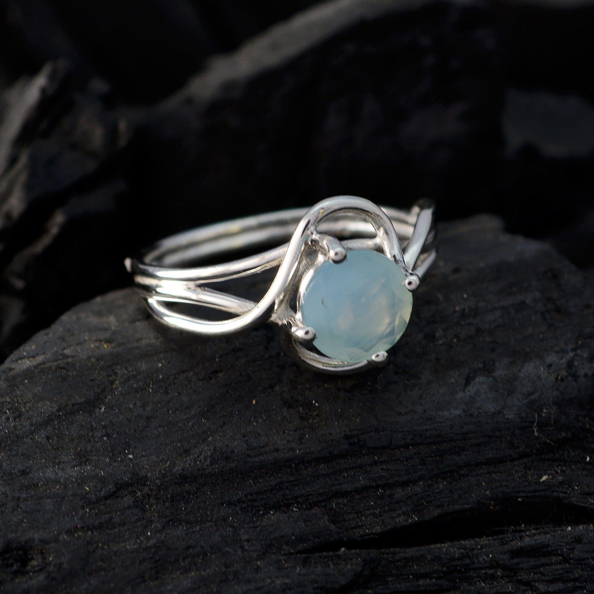 Maya Aqua Solitaire Ring with Elegant Silver Design