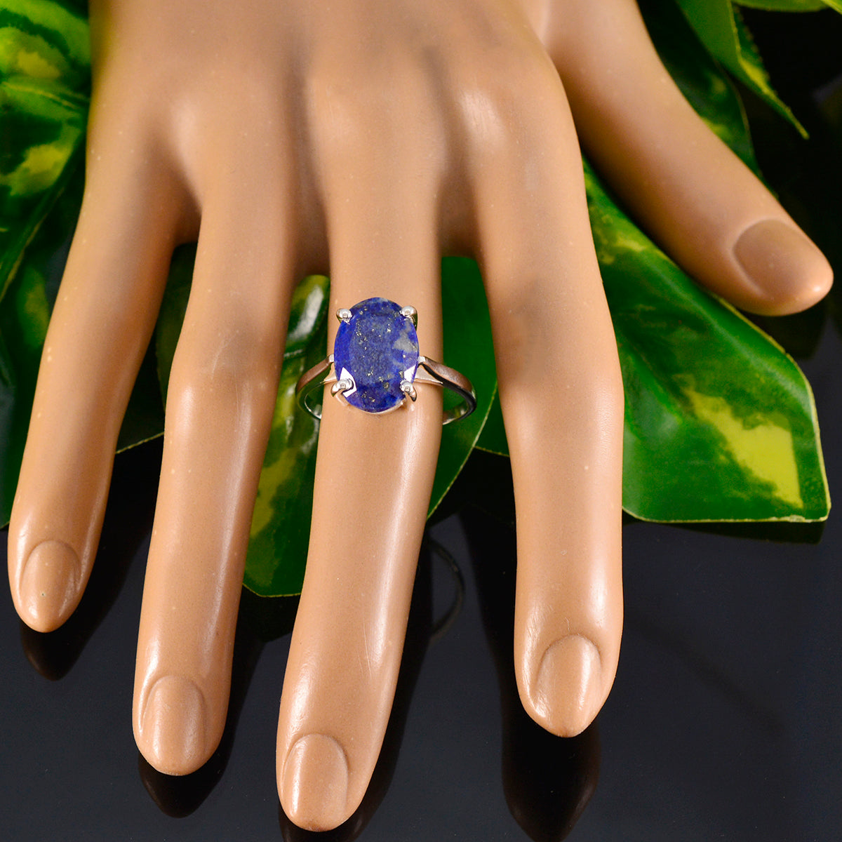 Dewi Blue Solitaire Ring with Oval Gemstone