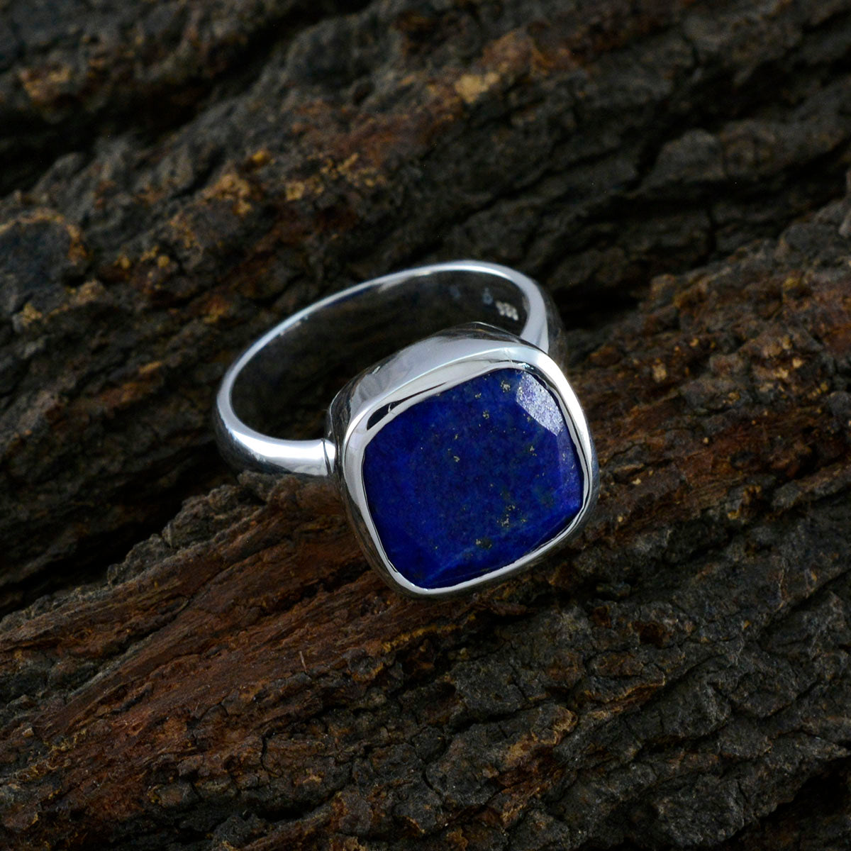 Lorena Blue Solitaire Ring with Sterling Silver Band
