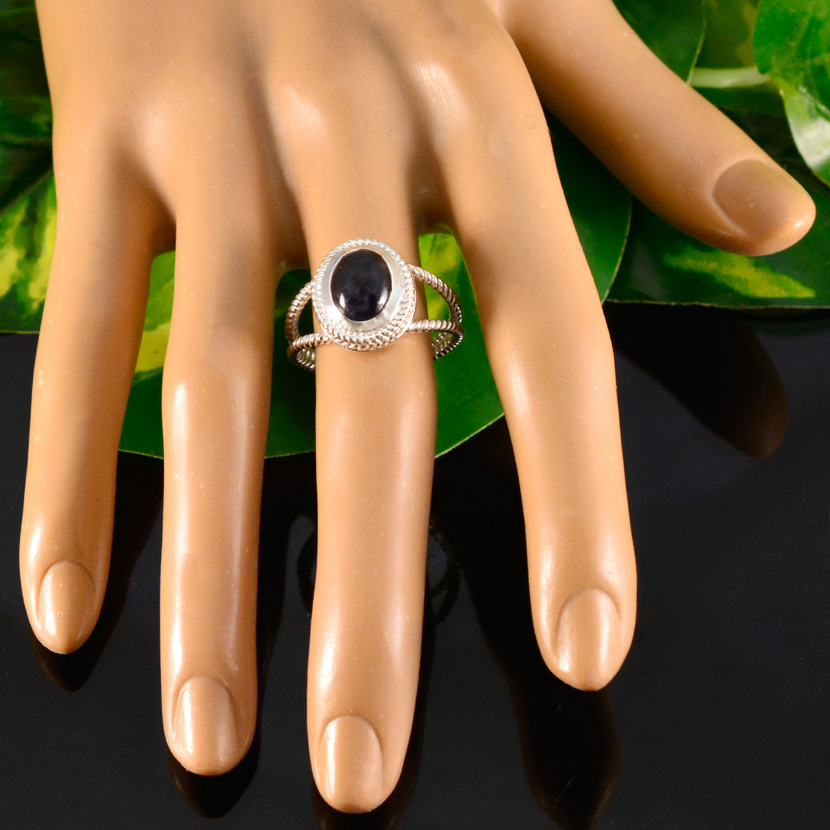 Emma Blue Solitaire Ring with Silver Rope Design