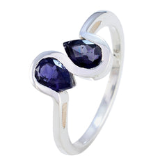 Meera blue toi et moi ring with two pear-shaped blue gemstones set in silver band