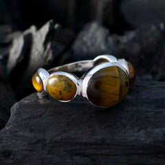 Victoria contemporary brown gemstone ring with polished silver band and multiple oval brown stones
