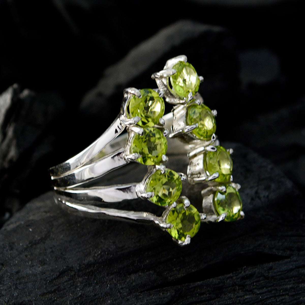 Eleanor silver ring with six faceted peridot stones in a stacked design green gemstone octagon ring for elegant wear