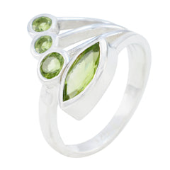 Camila sterling silver green gemstone ring for women with marquise peridot center and three round peridot accents