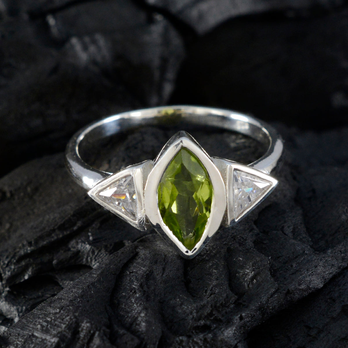 Putri green gemstone ring for women with marquise-cut green stone and two clear triangular side stones