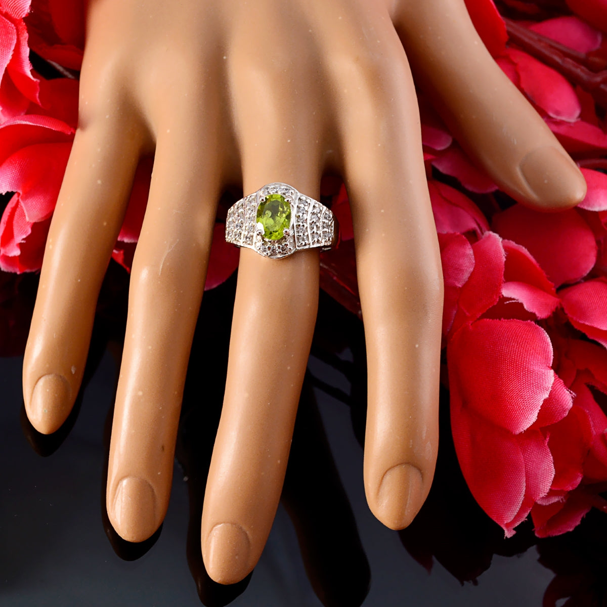 Isadora green halo ring for women with oval peridot center and pave cubic zirconia halo on silver band