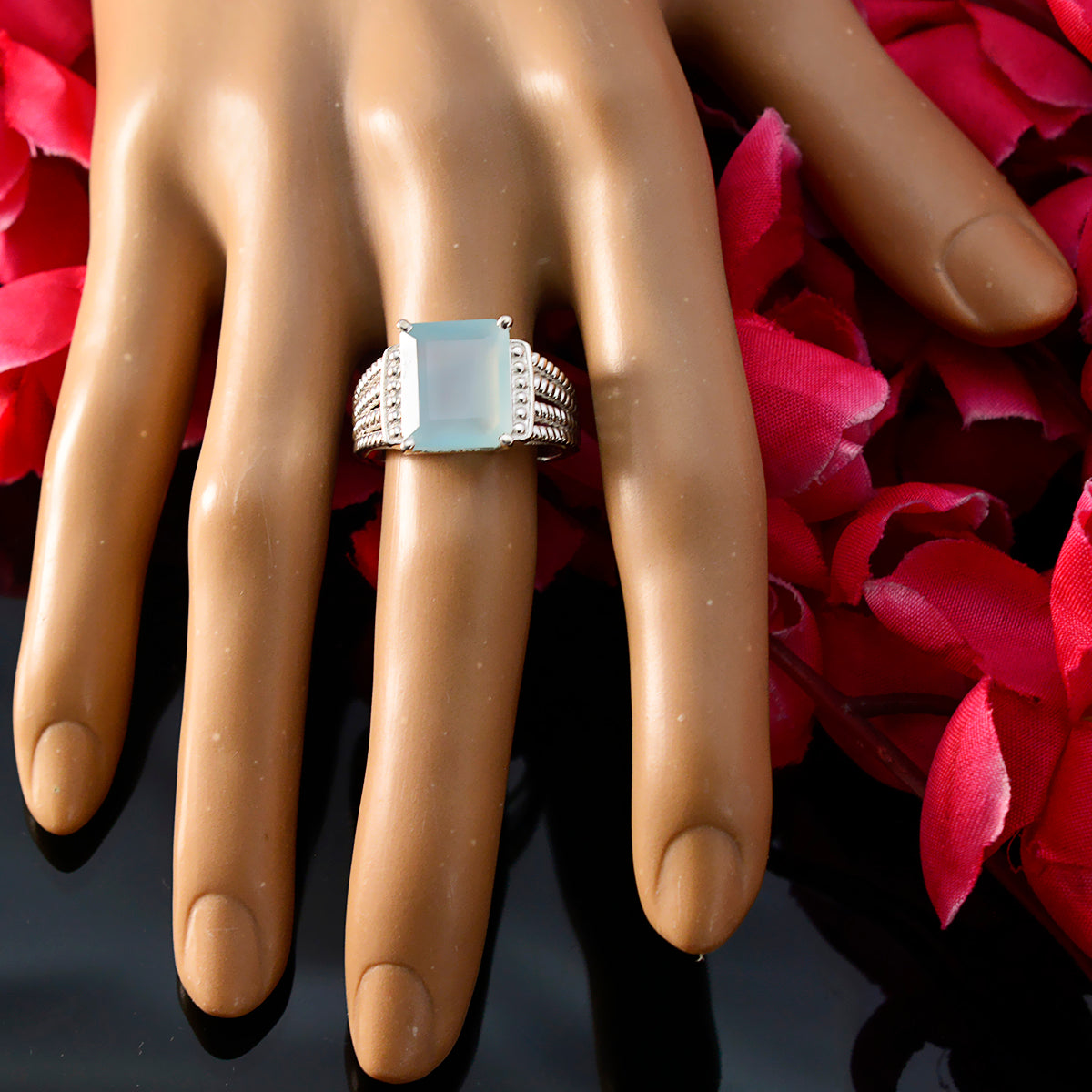 Leah Aqua Solitaire Ring with Elegant Silver Design