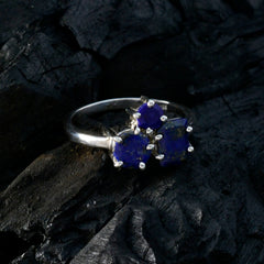 Noelia elegant blue trilogy ring for women with three blue stones set in silver band