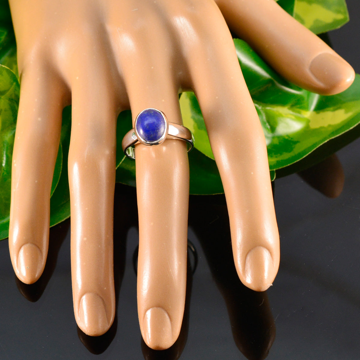 Riya Feminine Blue Solitaire Ring in Sterling Silver