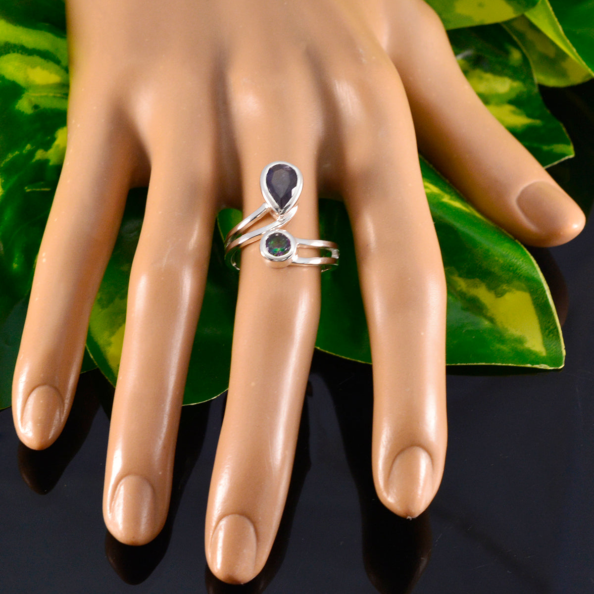 Hazel multicolor toi et moi ring sterling silver double band with pear and round iridescent stones on hand