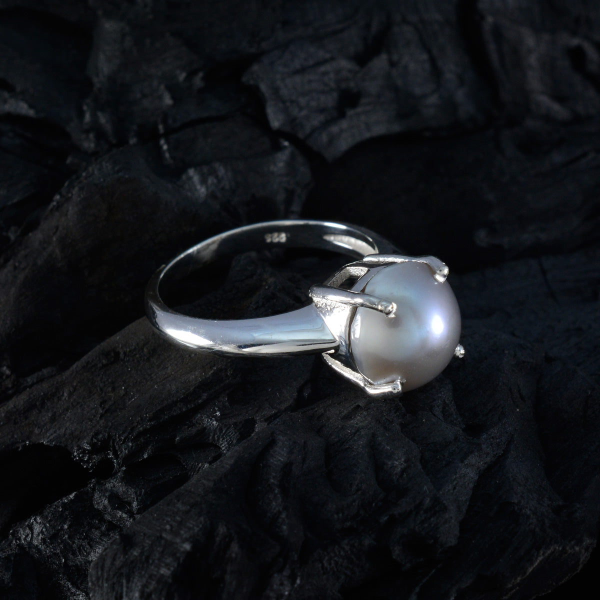Isla modern solitaire ring with a single pearl set on a sleek silver band