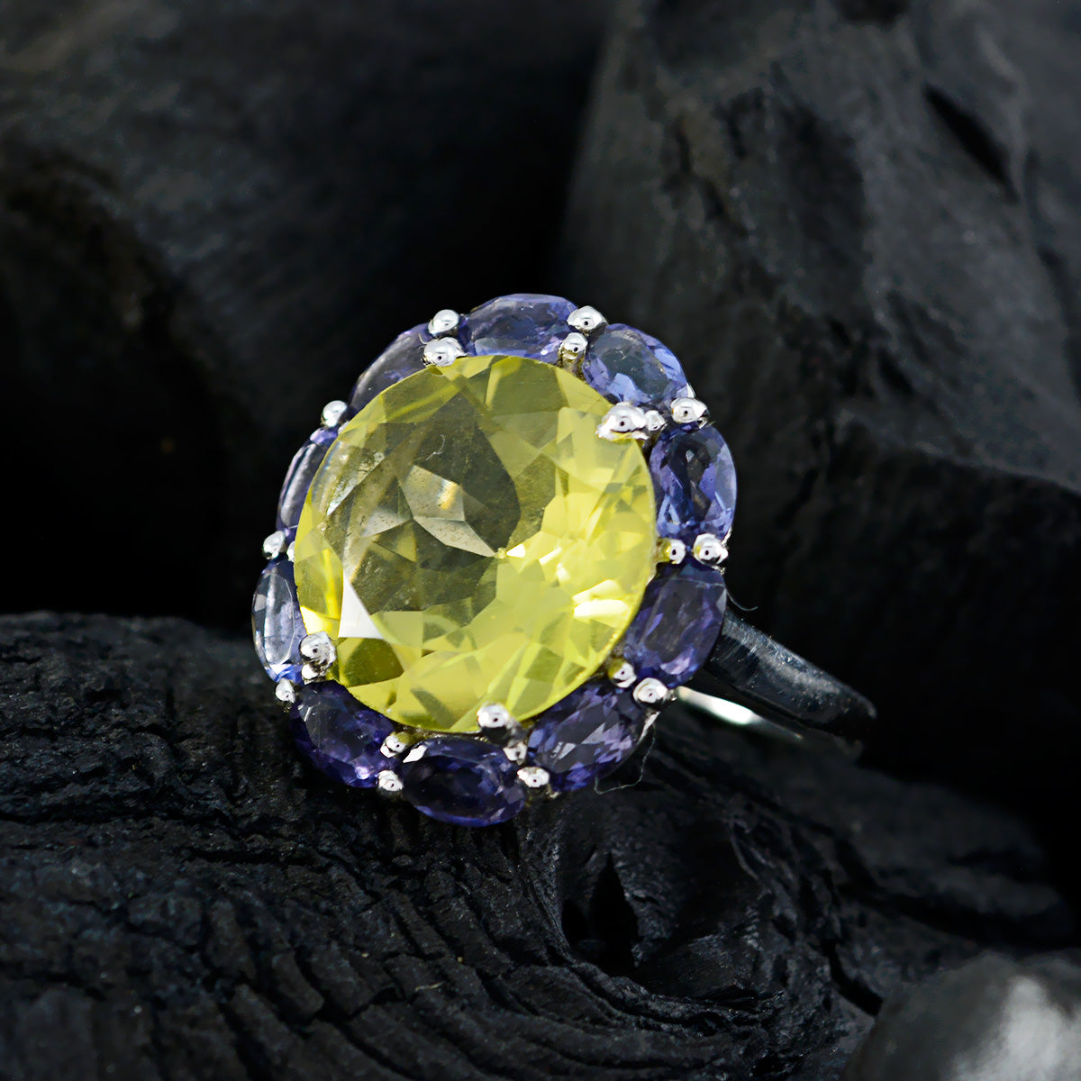 Lily multicolor cocktail ring with large yellow center stone and smaller purple stones surrounding it