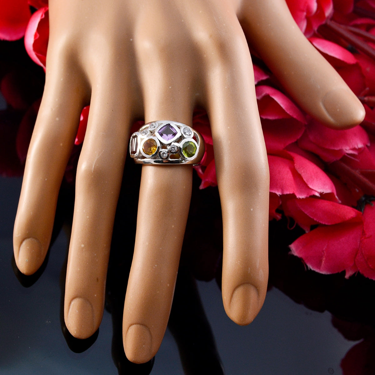 Isabella multicolor gemstone ring with amethyst citrine peridot on sterling silver band displayed on mannequin hand
