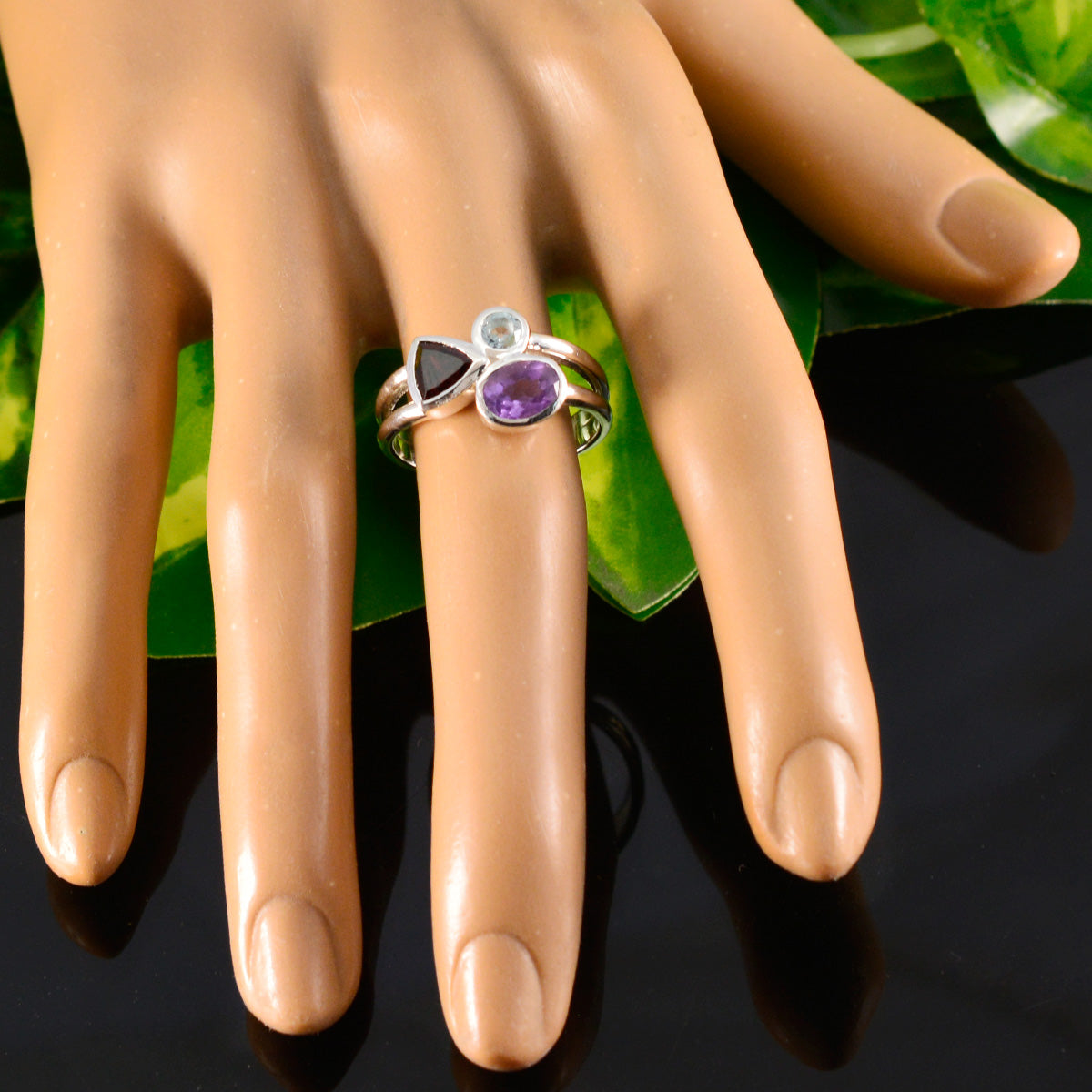 Nia multicolor gemstone trilogy ring silver band on mannequin hand with amethyst clear and dark triangular stones