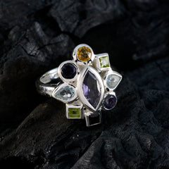 Patricia multicolor navratna gemstone ring with various colorful stones set in silver band