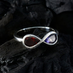 Zazlle multicolor toi et moi ring featuring infinity design with red and purple gemstones