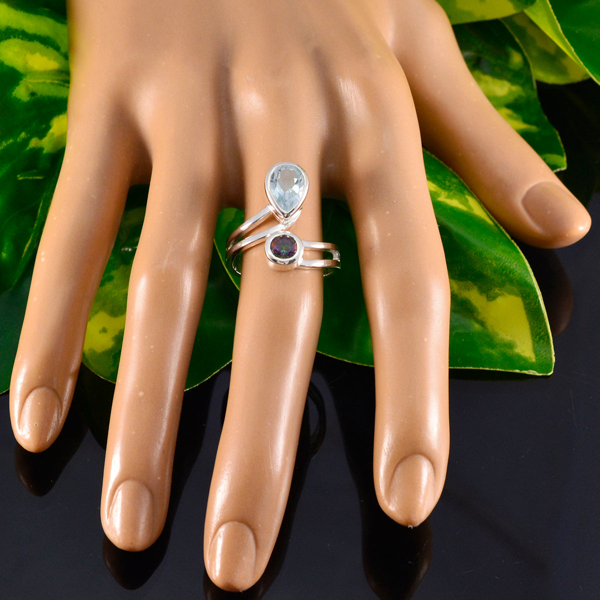 Harper multicolor toi et moi ring sterling silver with pear blue and round purple gemstones on display hand