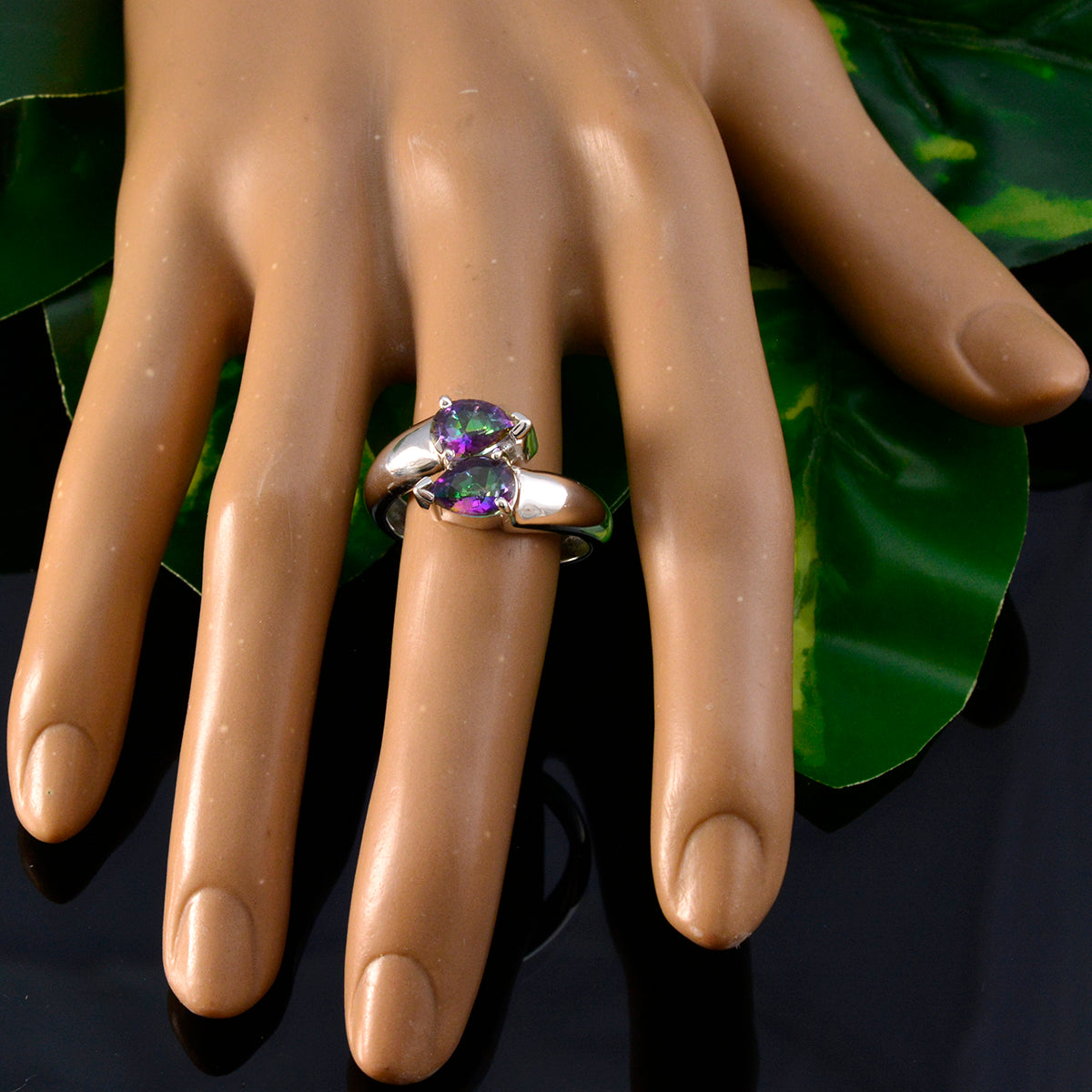 Gabriela silver multicolor Toi et Moi ring with two pear shaped mystic topaz stones on mannequin hand