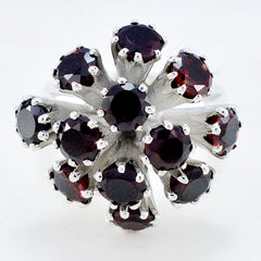 Chloe red gemstone statement ring with multiple deep red stones in silver setting