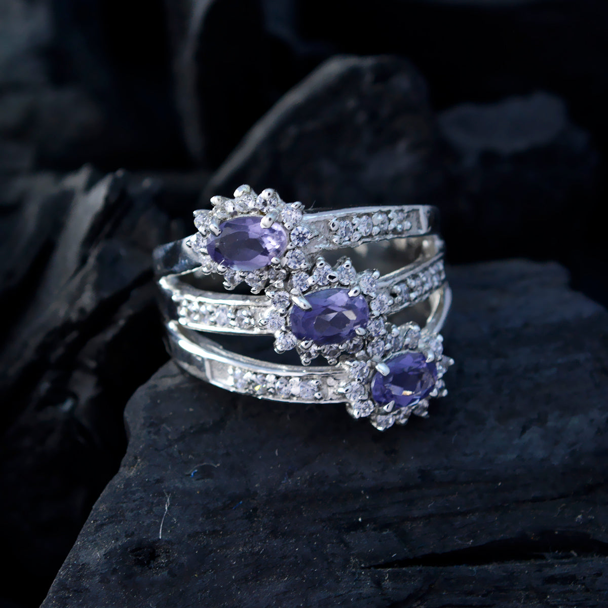 Maria trendy multicolor trilogy ring with three purple stones and sparkling accents on silver bands