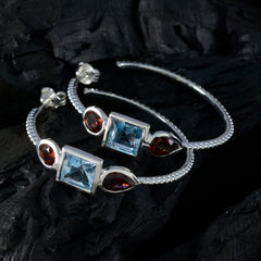 Trilogy gemstone earrings Riyo featuring sparkling blue and red stones set in silver design