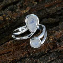 Isabella white toi et moi ring with pear and round moonstone cabochons set in polished silver band