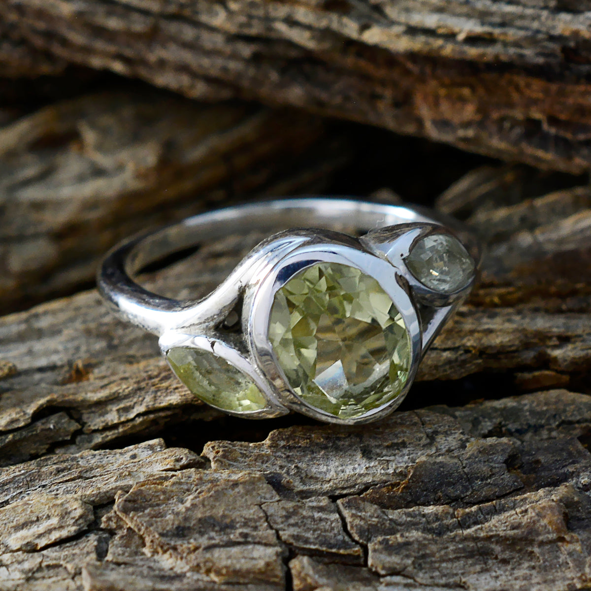 Fernanda yellow gemstone trilogy ring with three yellow gemstones set on a silver band