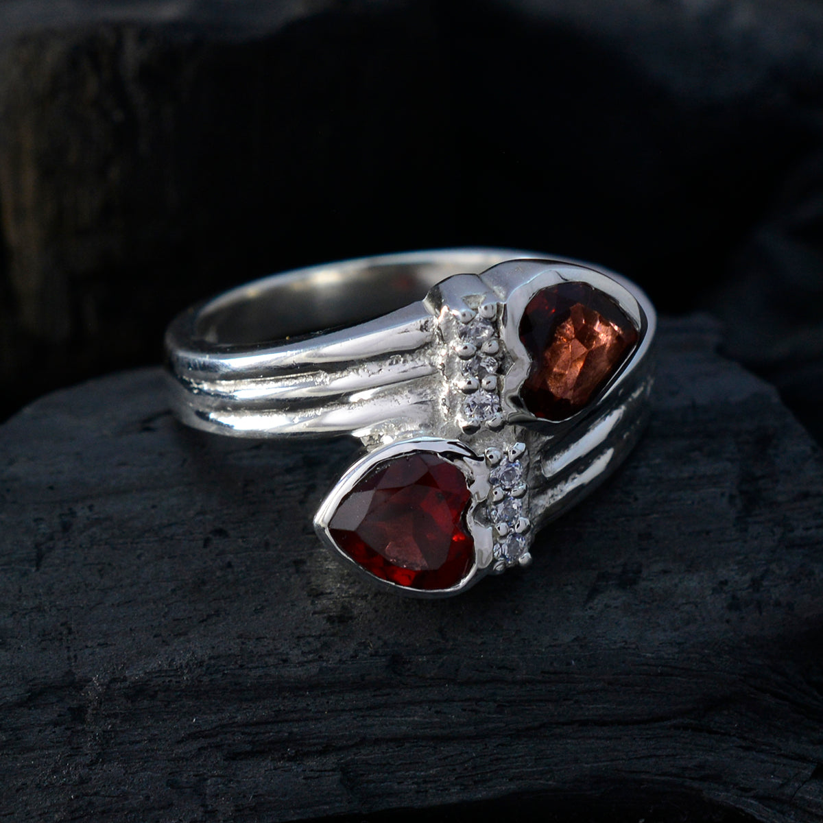 Daniela abstract red gemstone ring with dual heart-shaped red stones and silver band