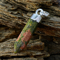Zoey Green pendant made with a natural stone crystal in a silver setting, featuring unique colors and designs
